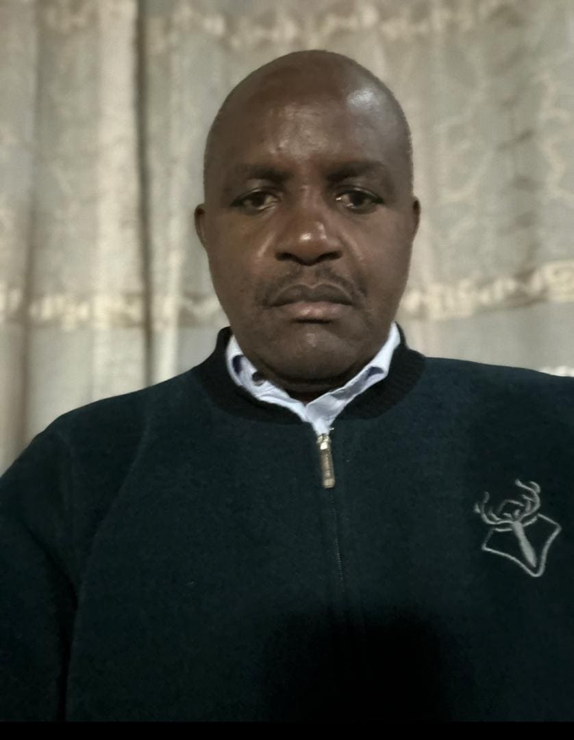 A portrait of Leonard B. Shayo, Director